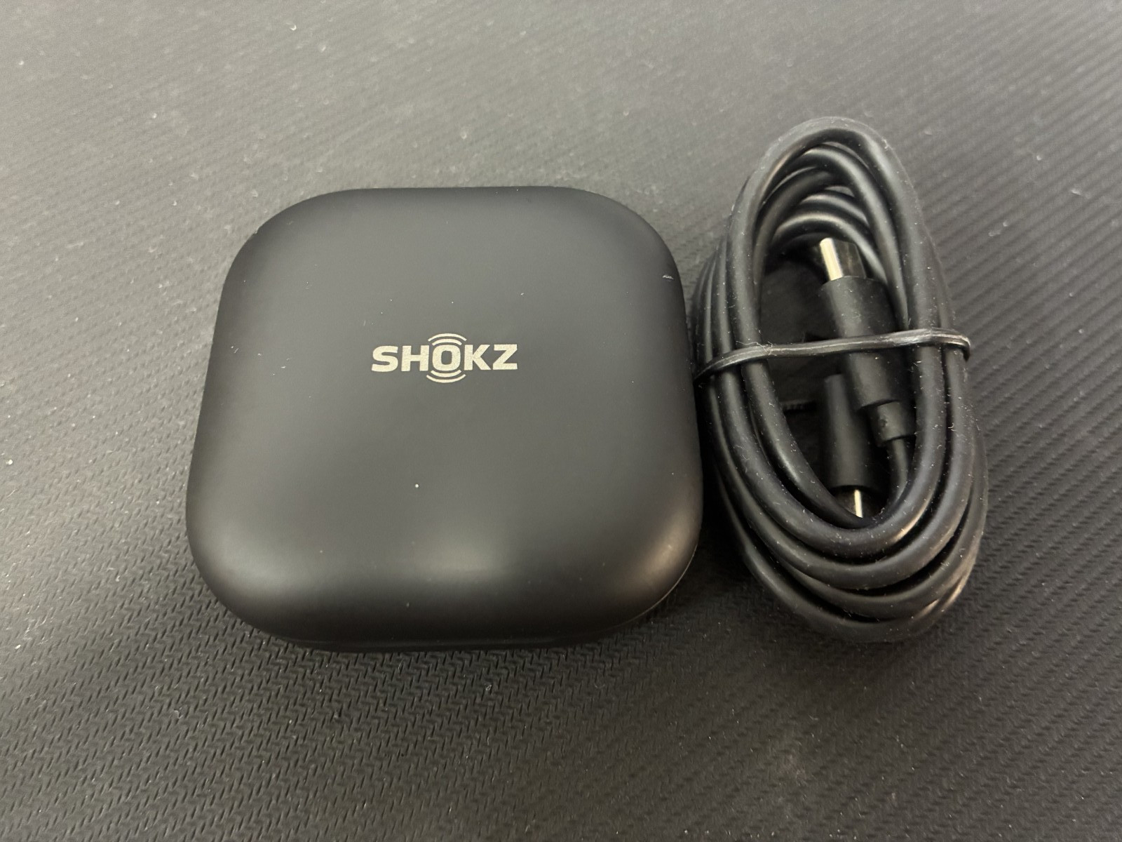 Shokz OpenFit Open-Ear Charing case (T910) with cable only , no earbuds