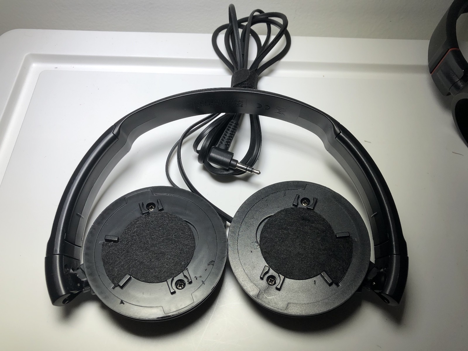 Lot of 2 Sony Stereo Headphones (no cushioning) – MDR-ZX100 and unknown Model