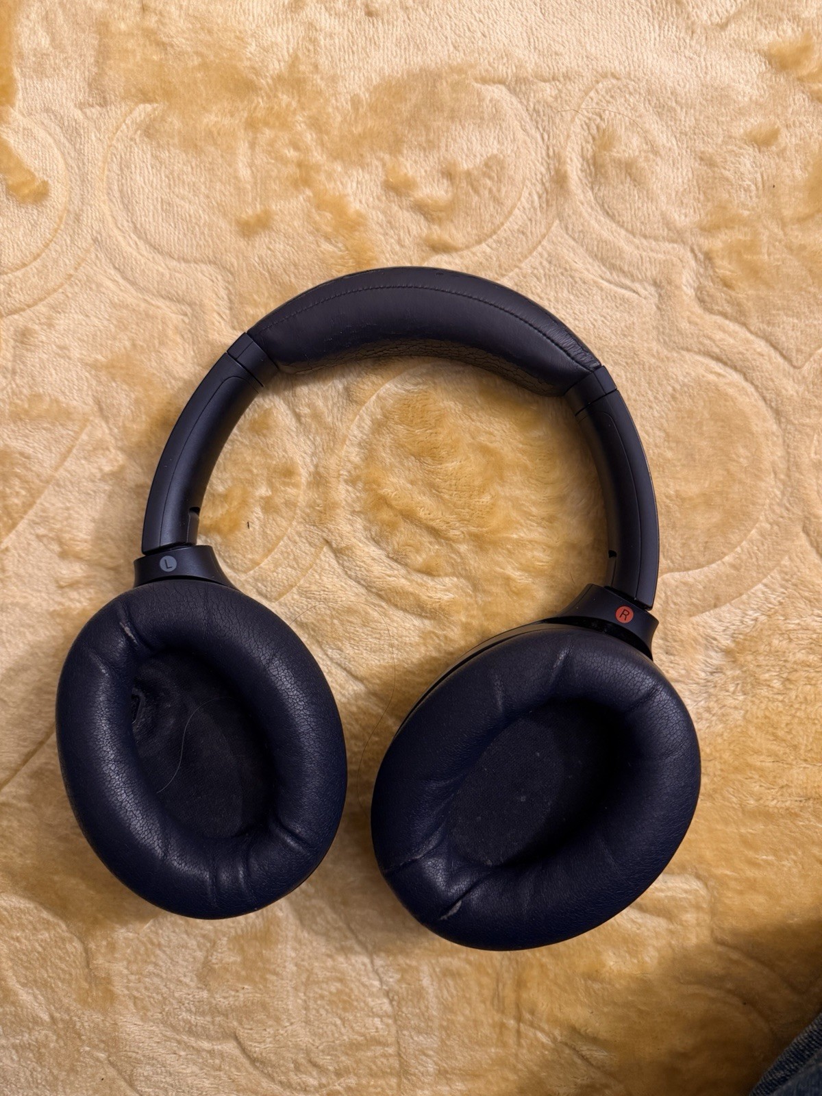 Sony WH-1000XM4 wireless noise cancelling headphones in Midnight Blue.