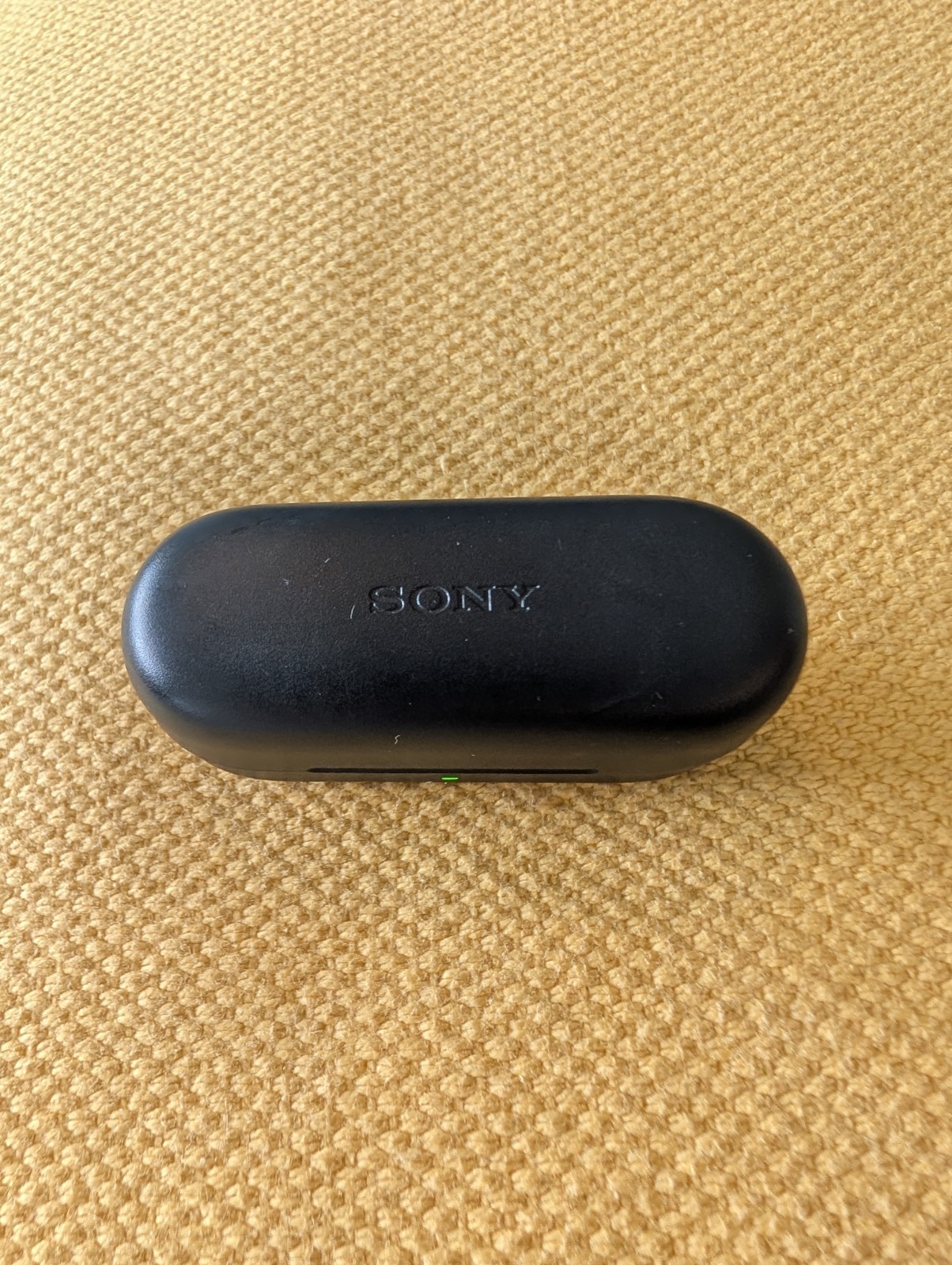 Sony WF-C510 wireless earbuds in black.. Comes With A New Charging Cable