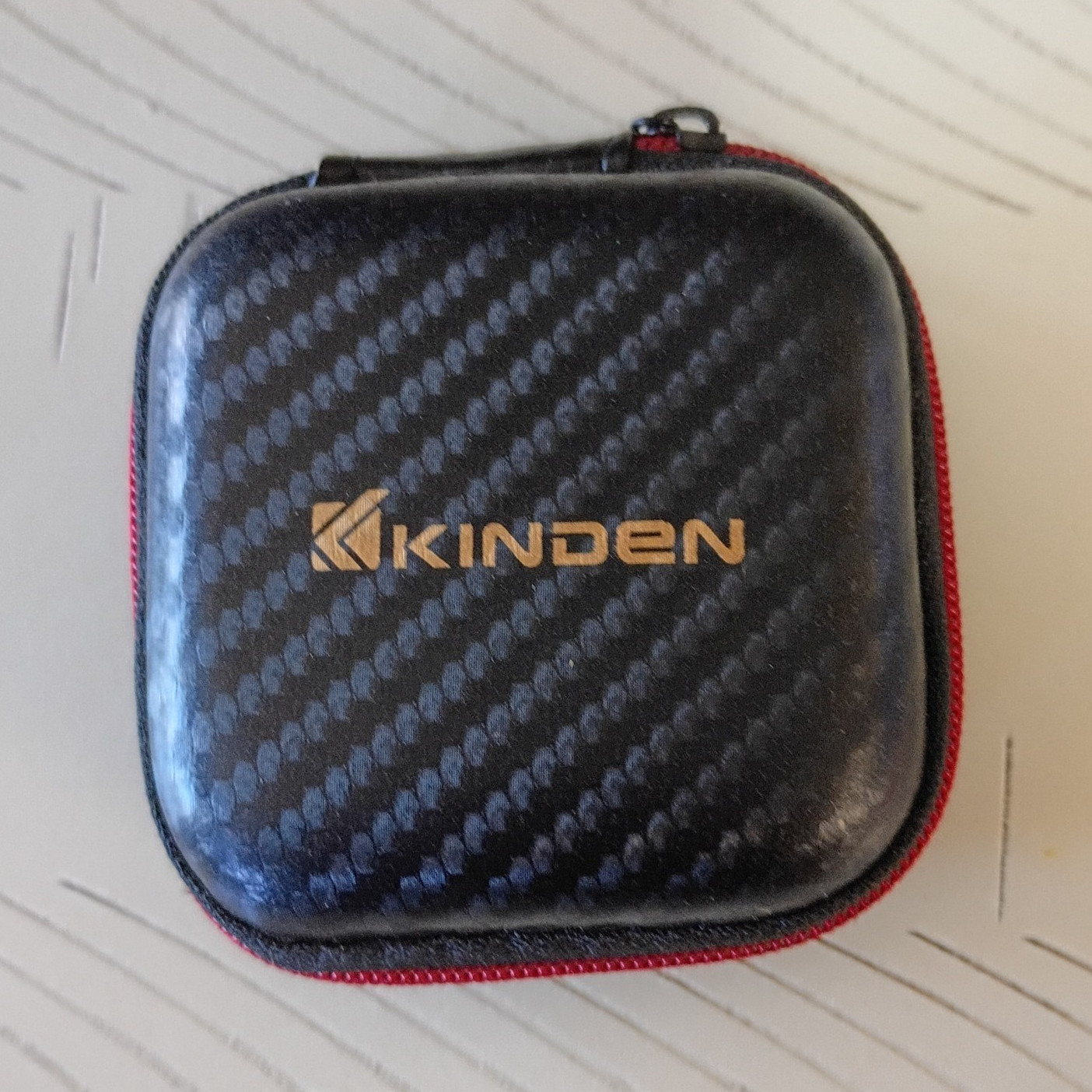 Kinden wired In-ear Earbuds with Black/Red Hard Travel Case Zipper Closure