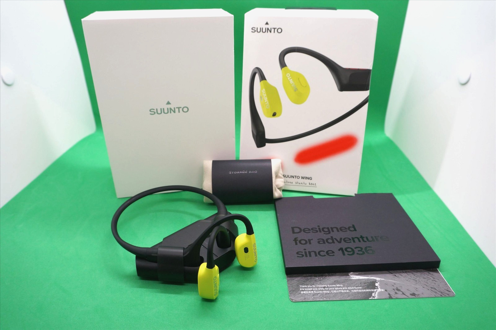 Suunto Wing Bone Conduct Headphones in Lime with flashing Red safety light IP67