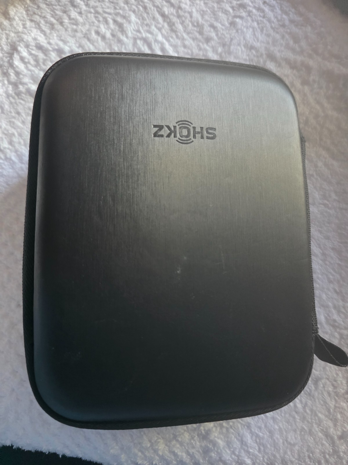 shok open comm black Bluetooth wireless in their protective case