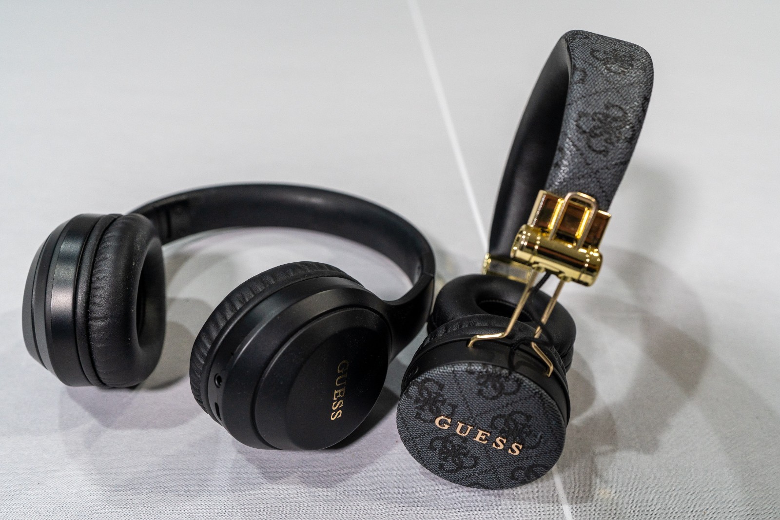Lot of 2 Guess Wireless Headphones Mix Matte Black & 4G Monogram Gold Bundle