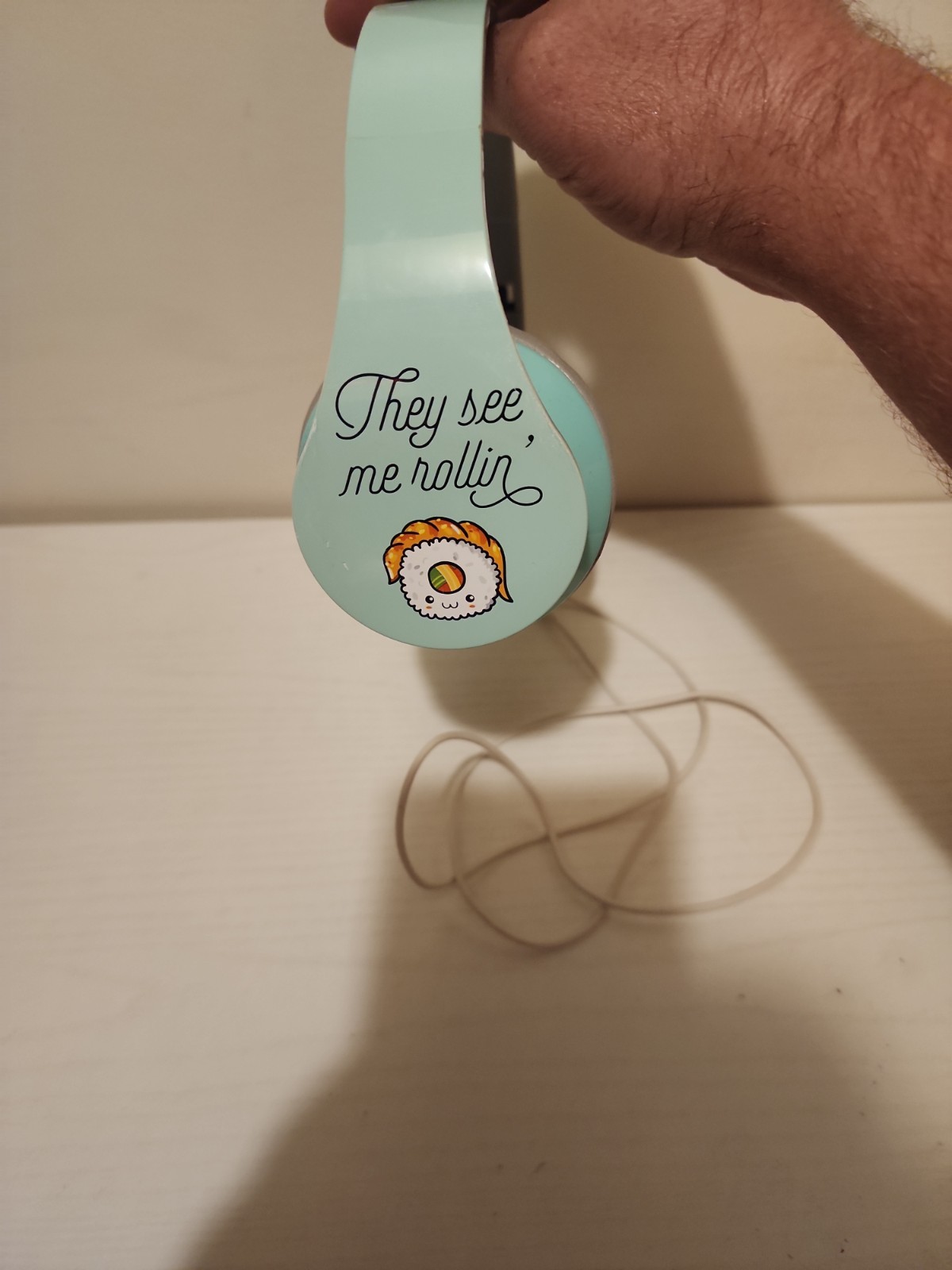 kids mint green corded headphones