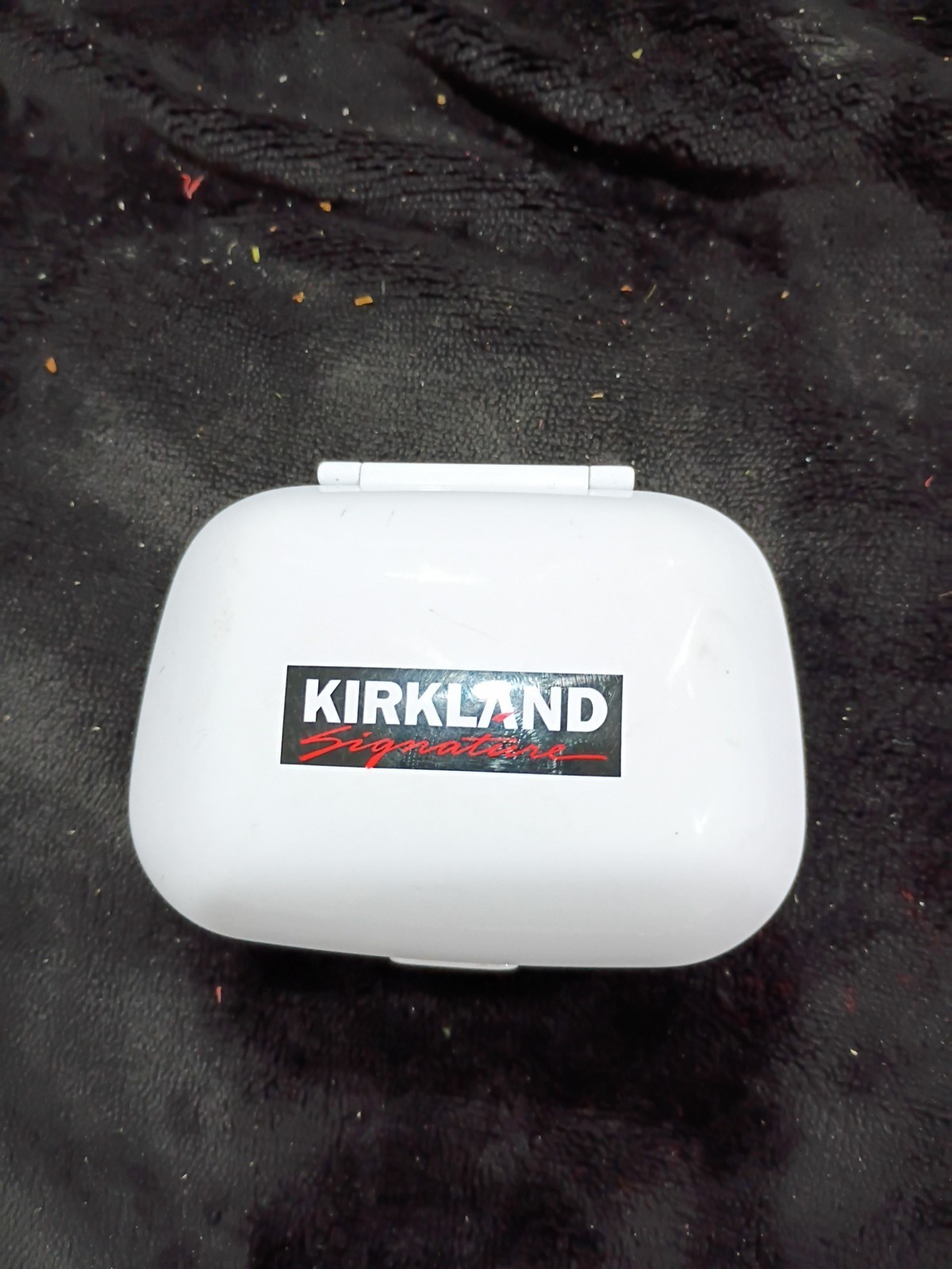Kirkland Signature brand headphones with charger. Very good condition, never use