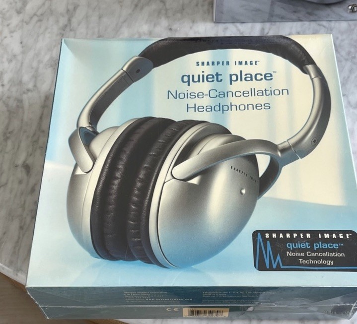 Sharper Image Quiet Place Noise Cancelling Headphones New in sealed box