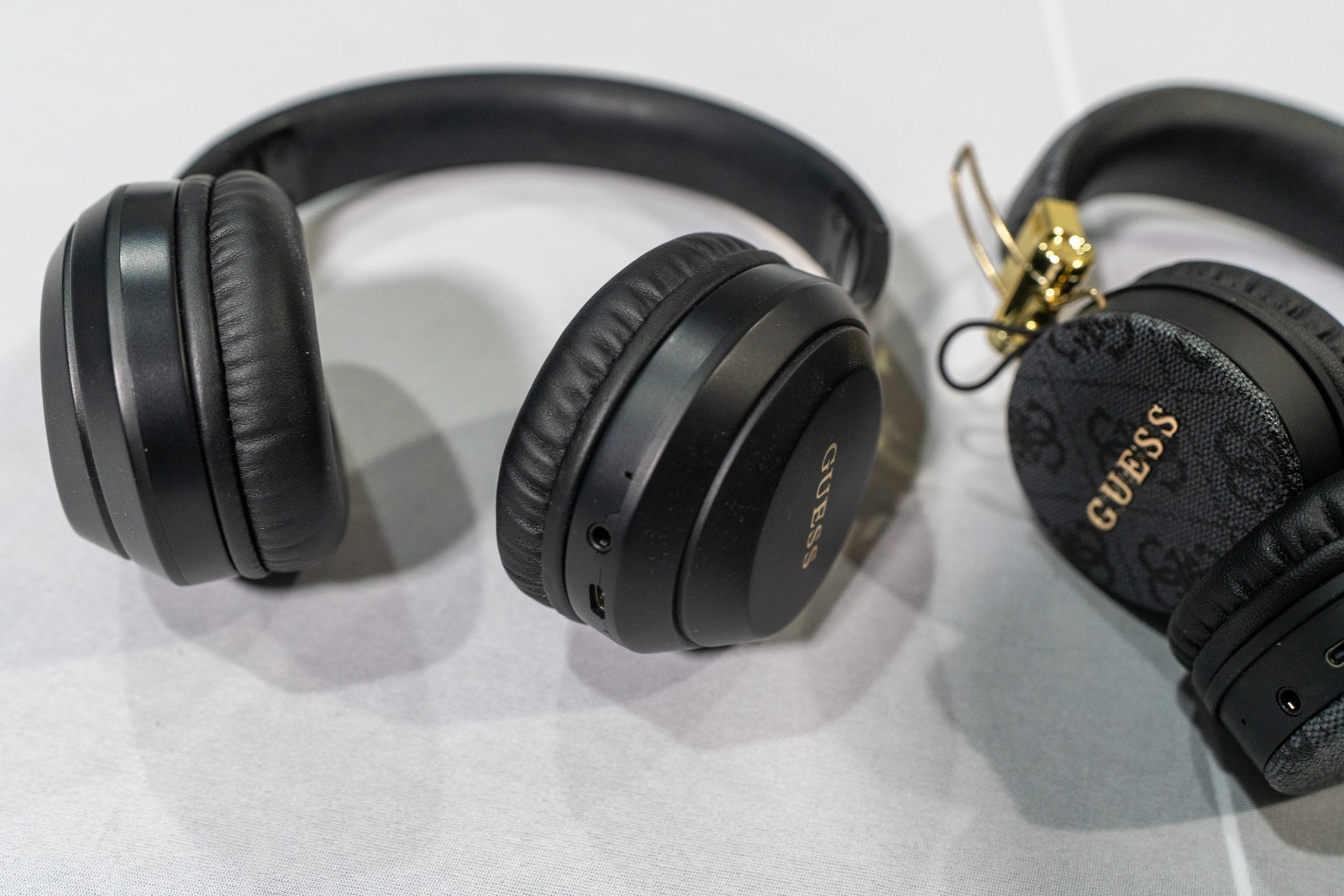 Lot of 2 Guess Wireless Headphones Mix Matte Black & 4G Monogram Gold Bundle