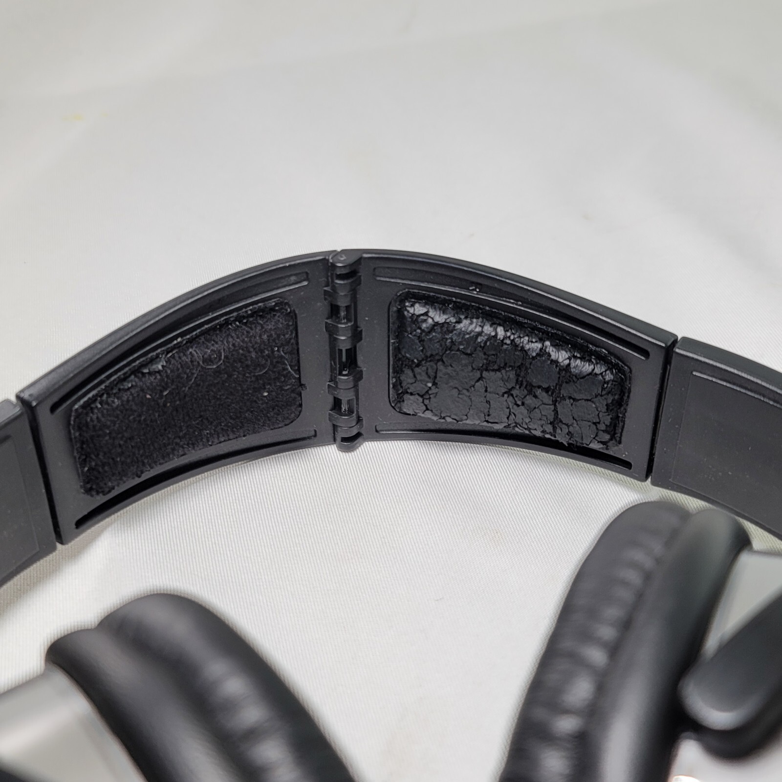 High Sierra Noise-Cancelling Headphones Cognizant logo