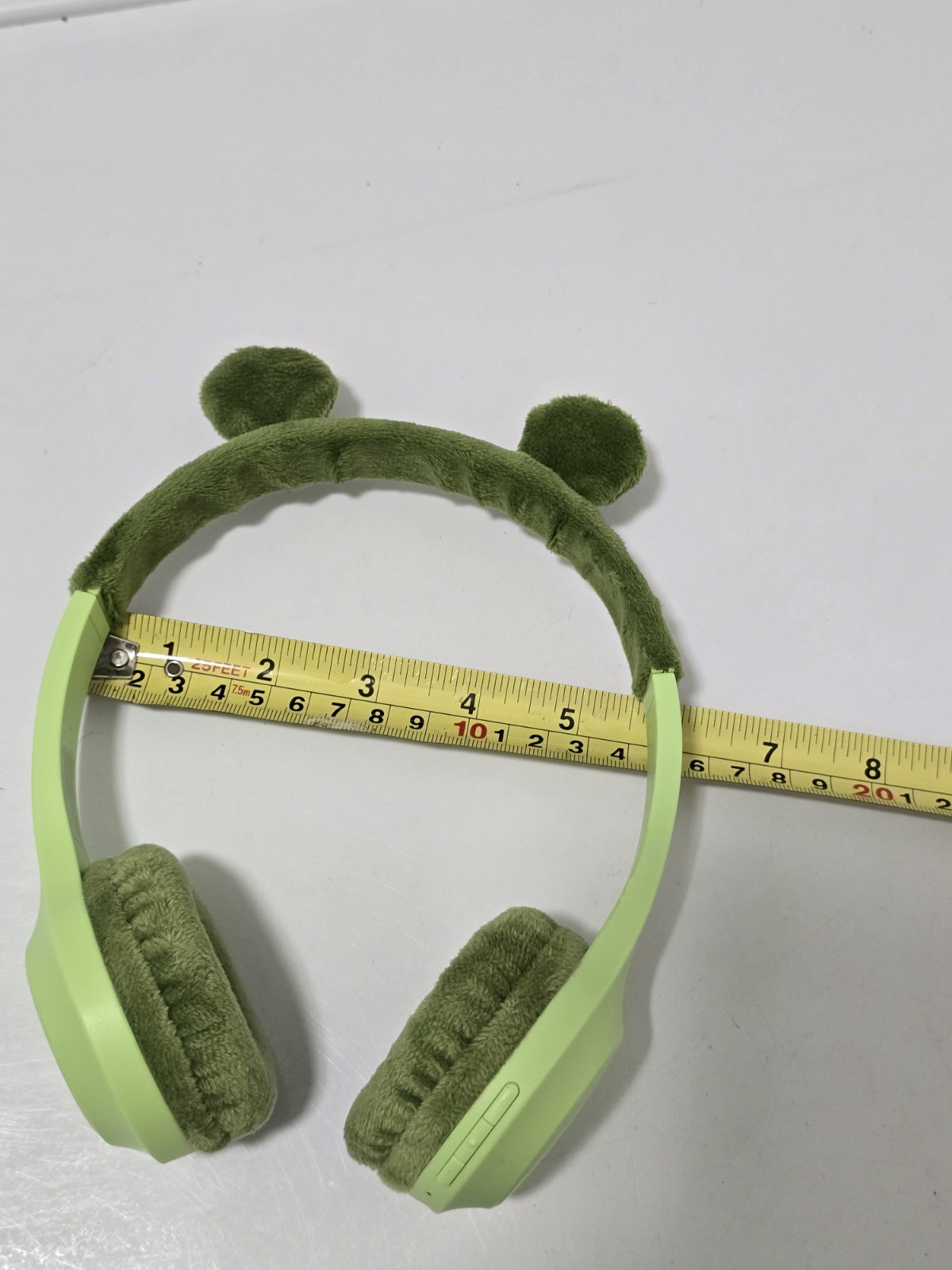 Green FROG GEMS brand wireless headphones, mod#WOE23. Fit Kids To Adults. Tested