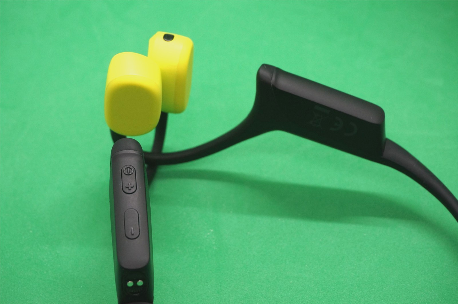 Suunto Wing Bone Conduct Headphones in Lime with flashing Red safety light IP67