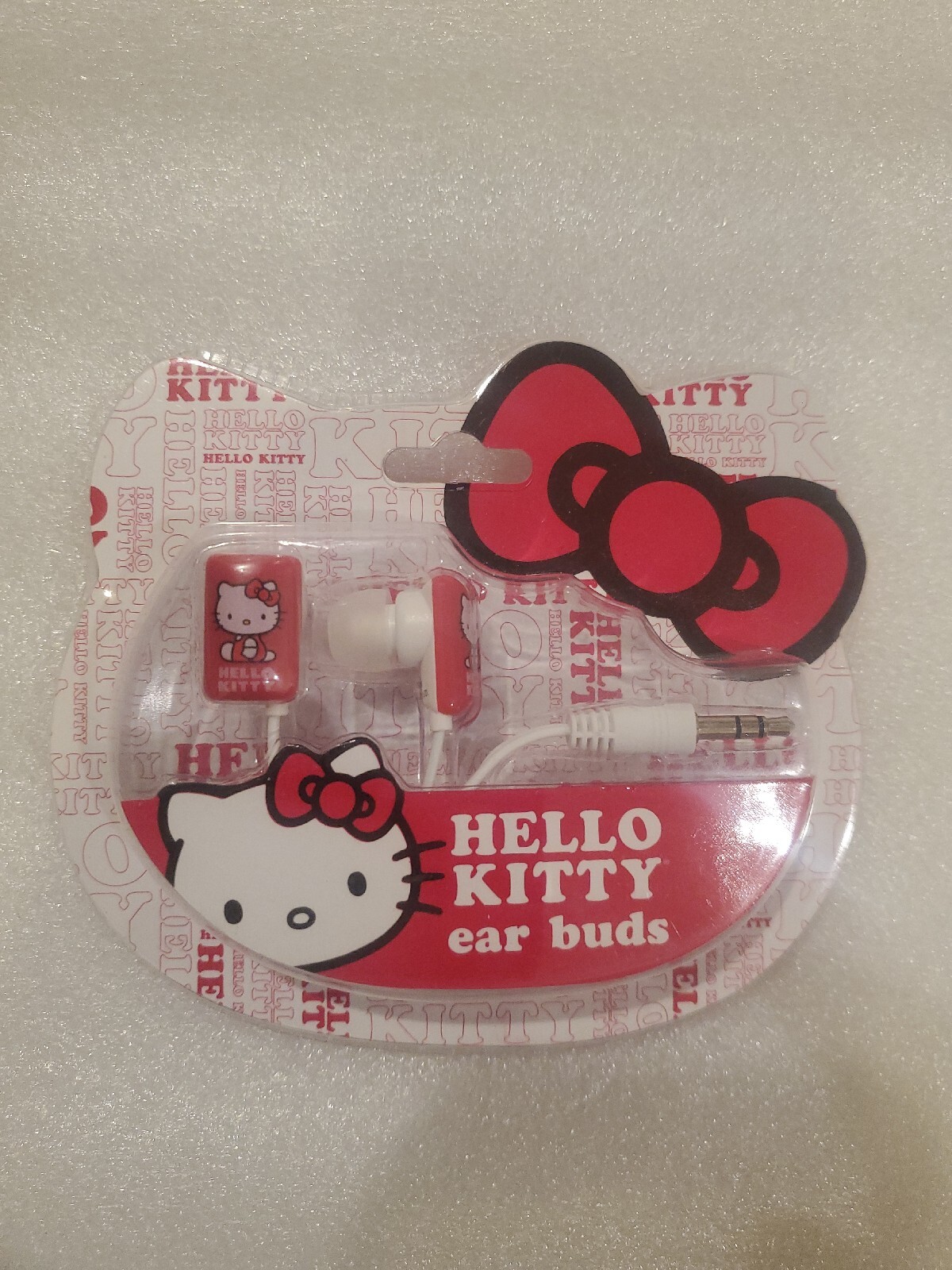 Hello Kitty Ear Buds Headphones Sanrio Sakar 2013, Wired/Corded.3.5mm Plug.