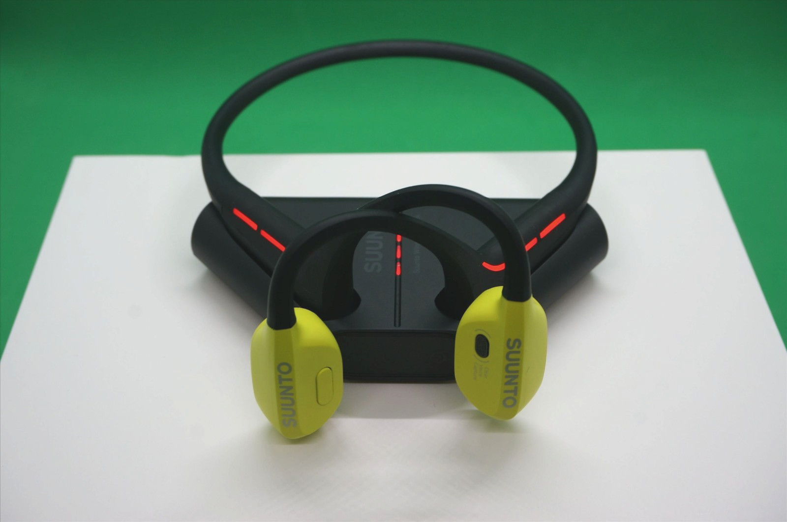 Suunto Wing Bone Conduct Headphones in Lime with flashing Red safety light IP67