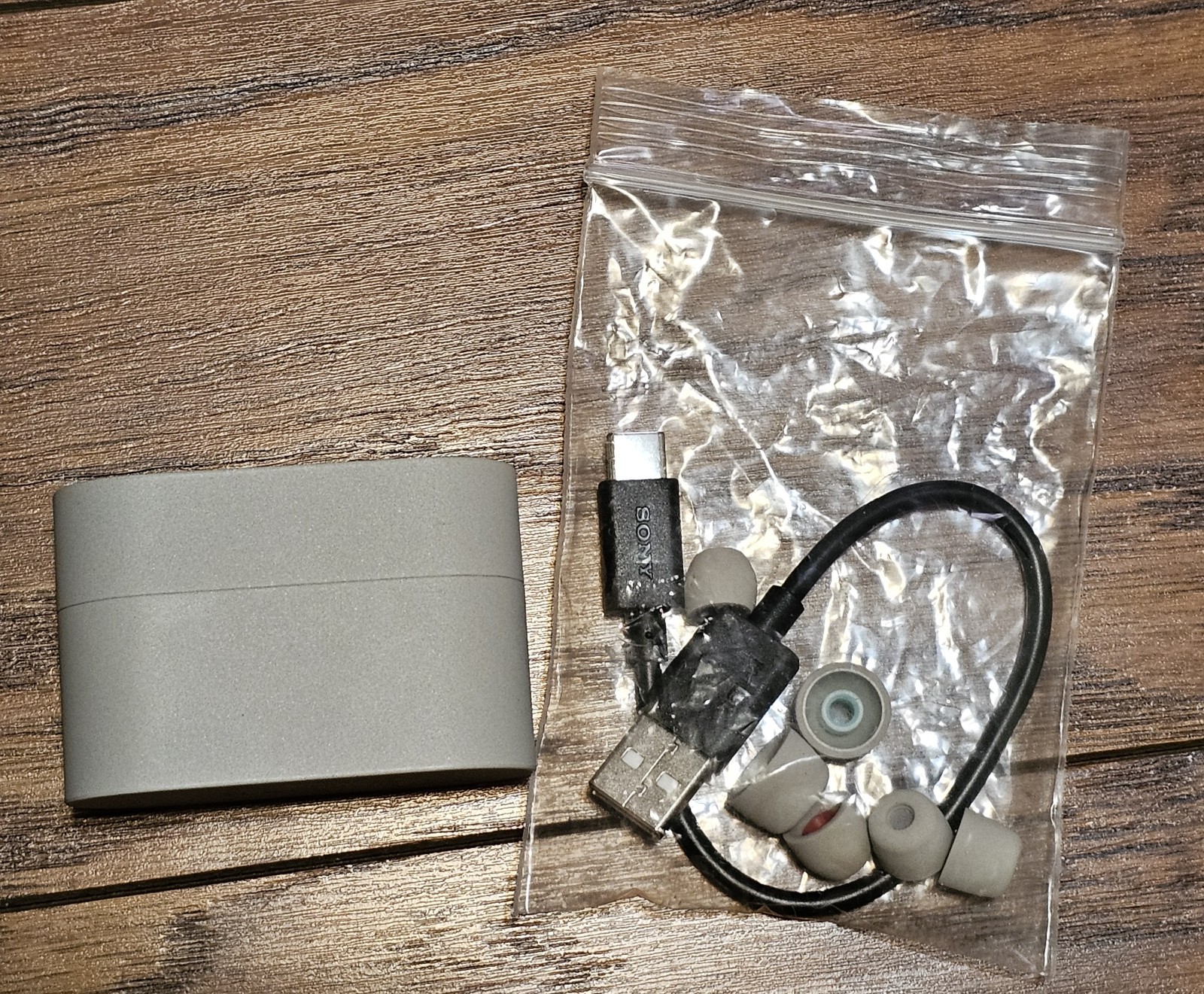 SONY WF-1000XM6 noise cancelling earbuds in open-box condition.