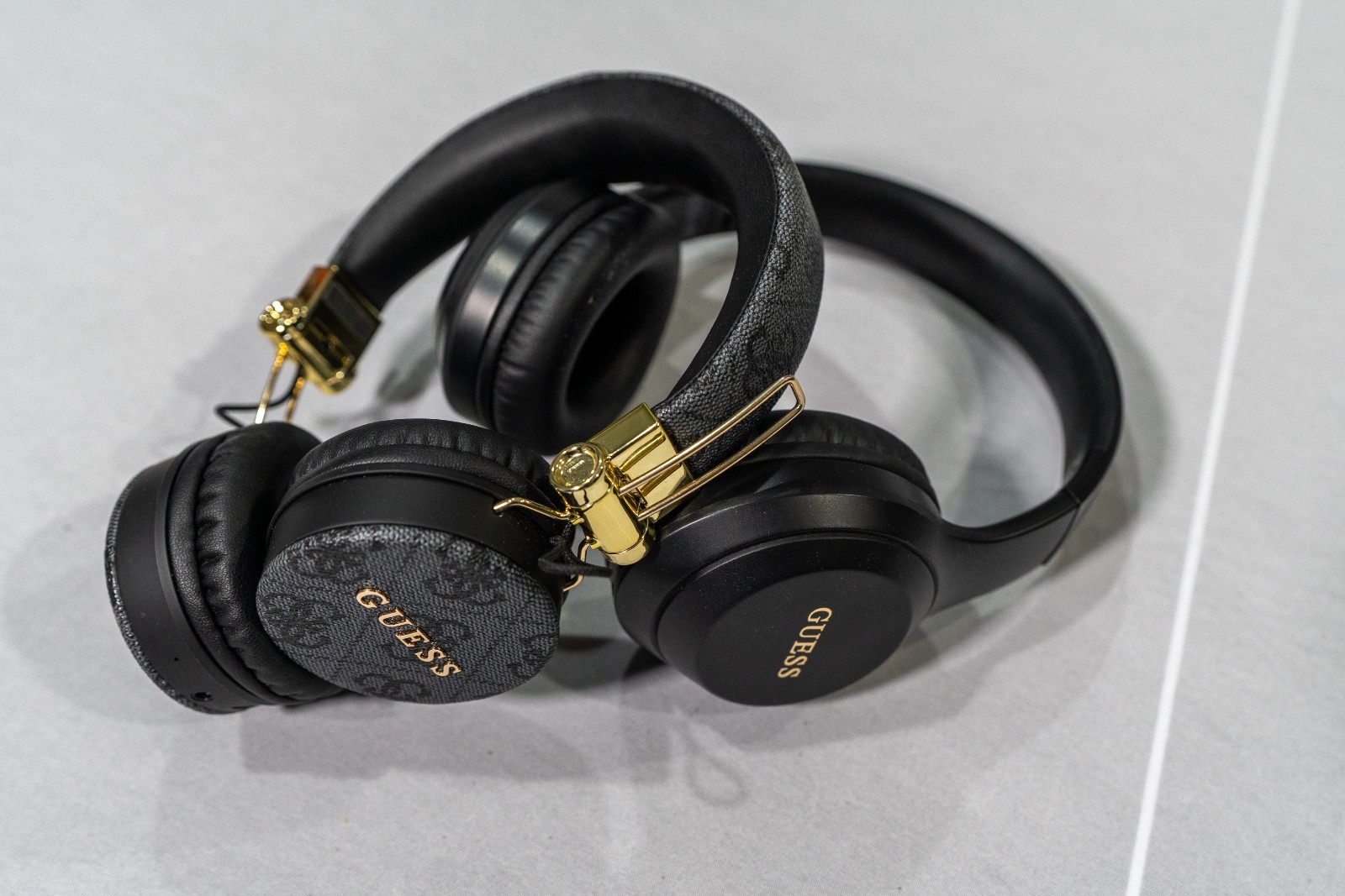Lot of 2 Guess Wireless Headphones Mix Matte Black & 4G Monogram Gold Bundle