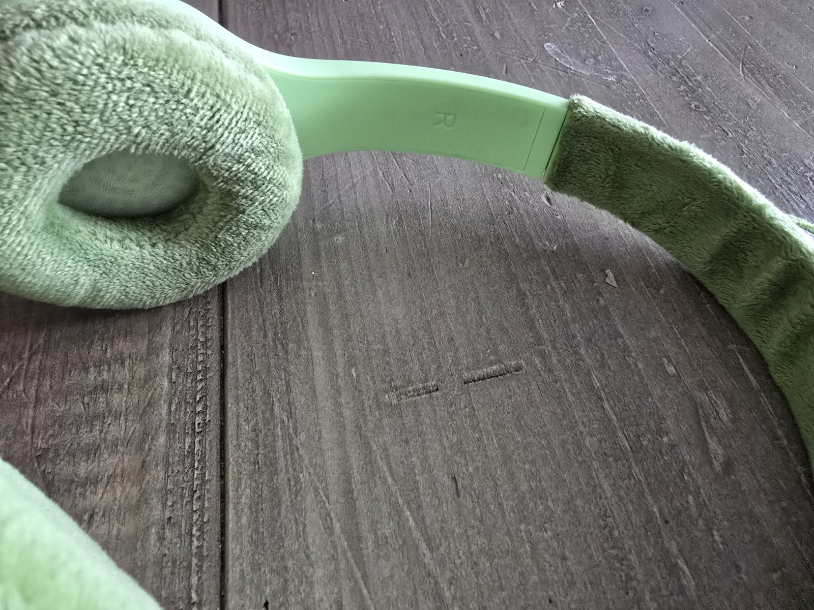 Green FROG GEMS brand wireless headphones, mod#WOE23. Fit Kids To Adults. Tested