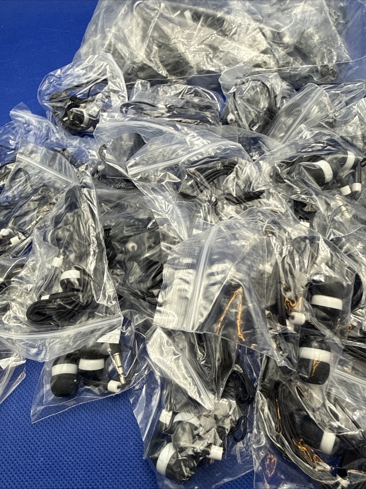 Lot Of 140 wired in-ear earphones (earbuds)