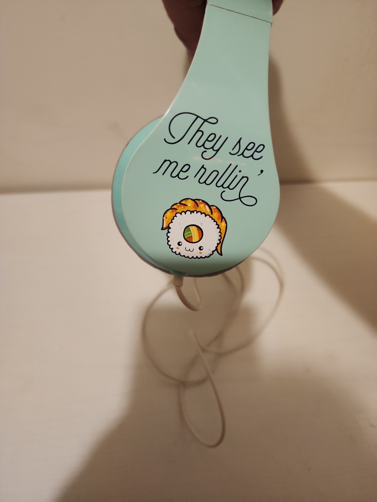 kids mint green corded headphones