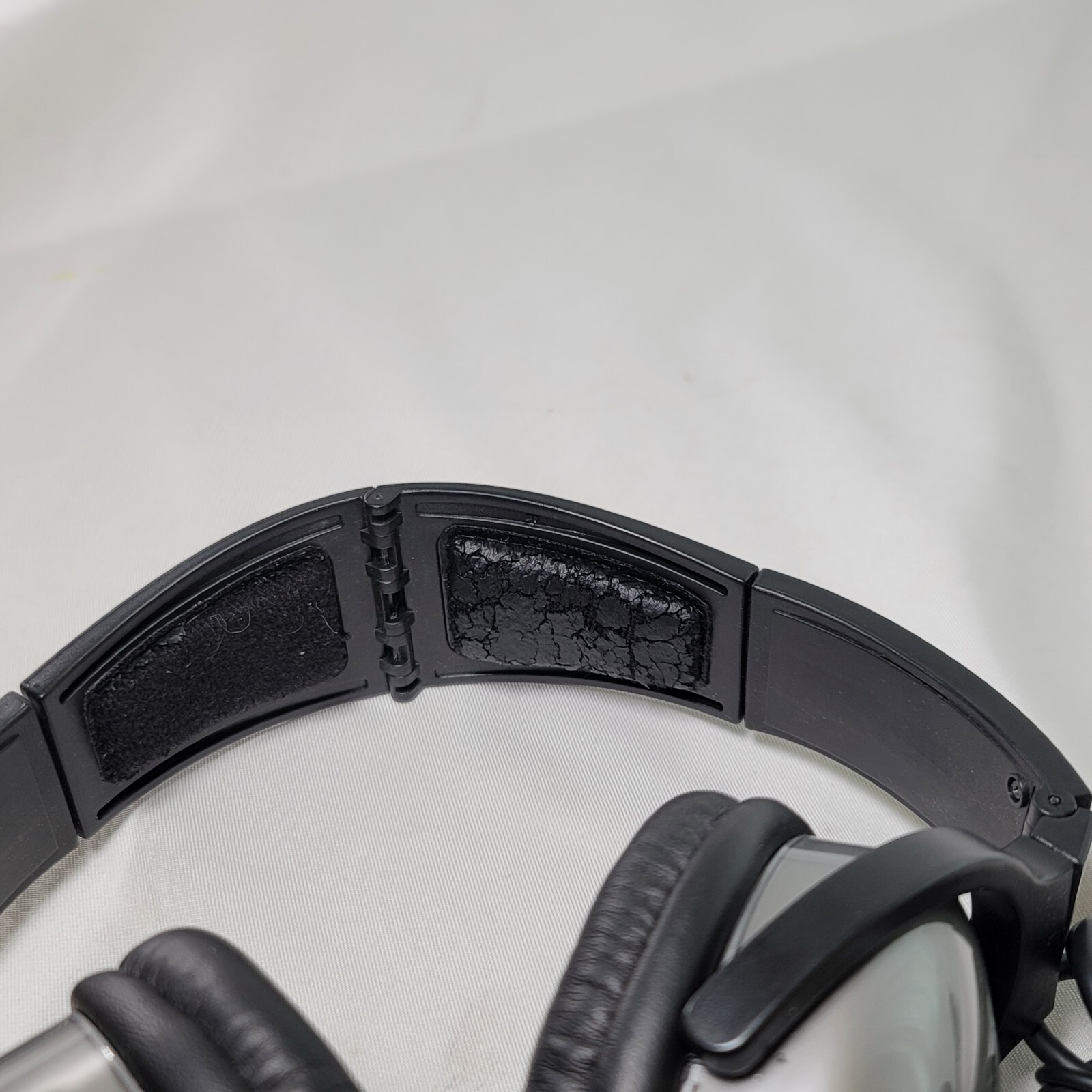 High Sierra Noise-Cancelling Headphones Cognizant logo
