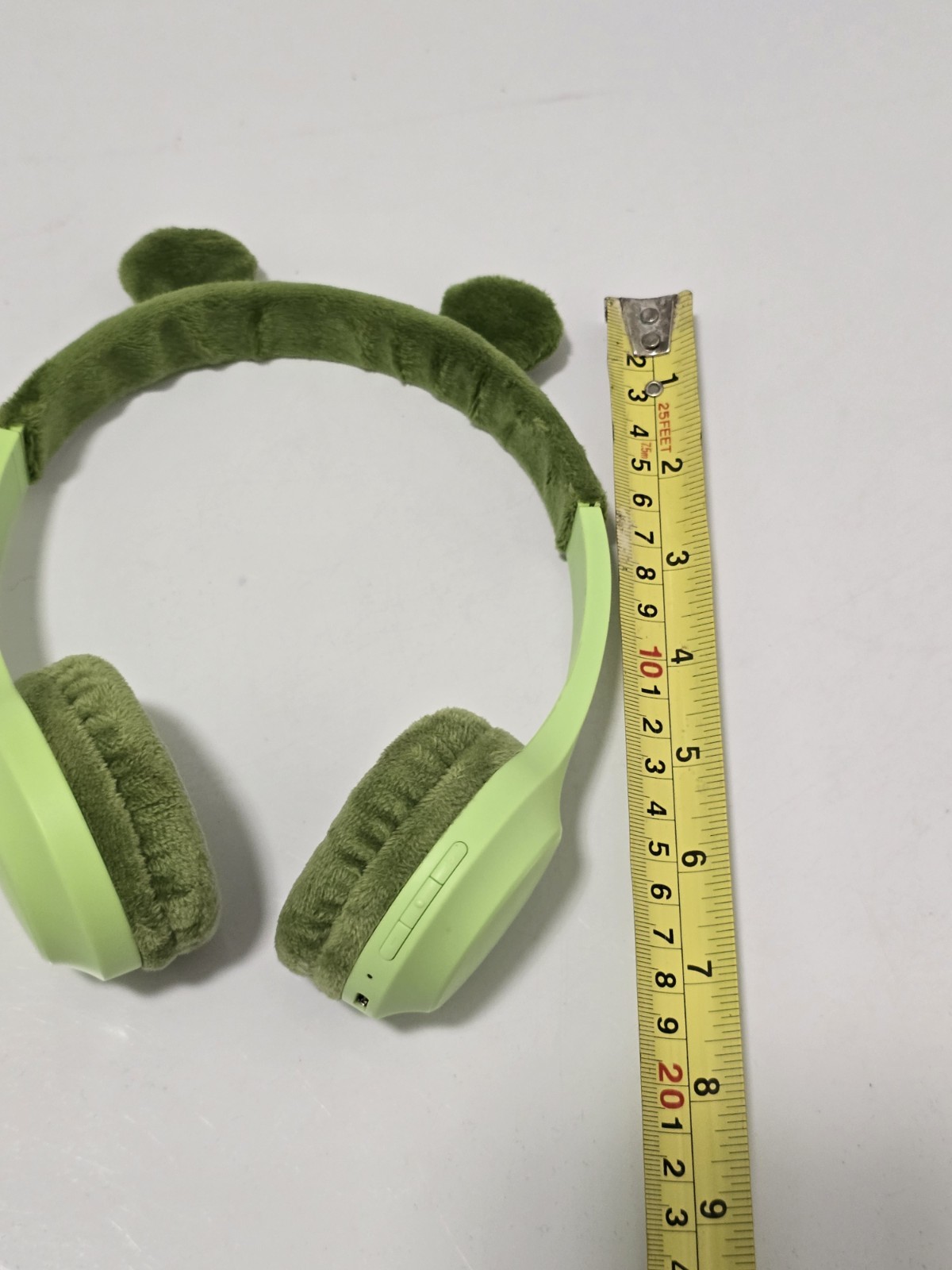 Green FROG GEMS brand wireless headphones, mod#WOE23. Fit Kids To Adults. Tested