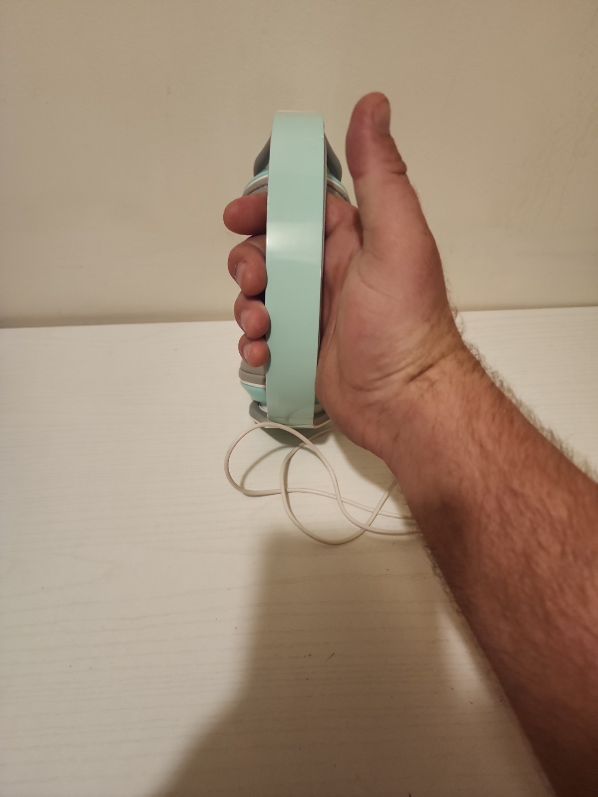 kids mint green corded headphones