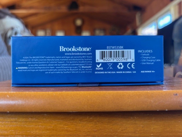 Brookstone Touch Power Two Earbuds & Built-In Power Bank New in Box