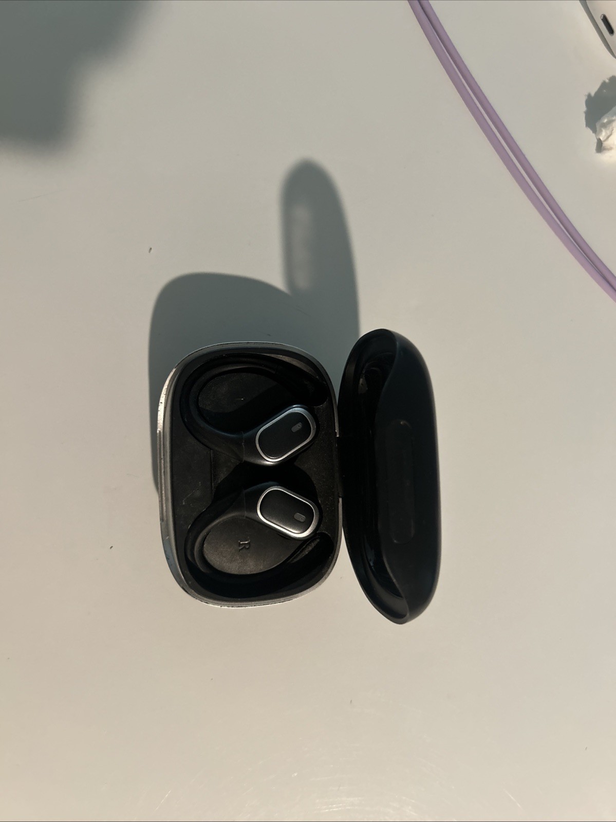 A Collection of Earbuds with Three AirPods Pro and Other Branded Headphones