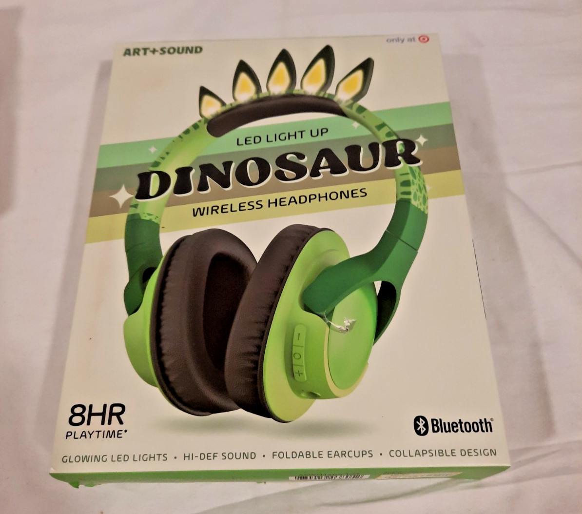 ART AND SOUND LED LIGHT UP DINOSAUR WIRELESS HEADHONES