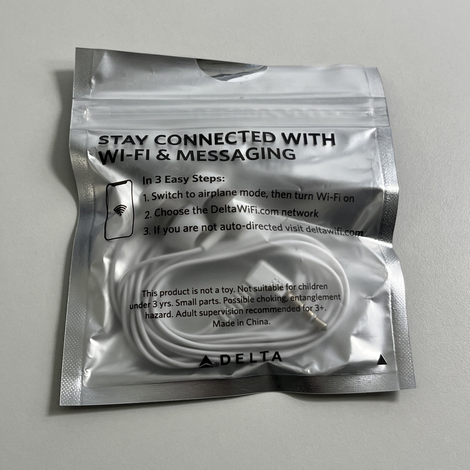 White & Silver Earbuds With Jack Connection