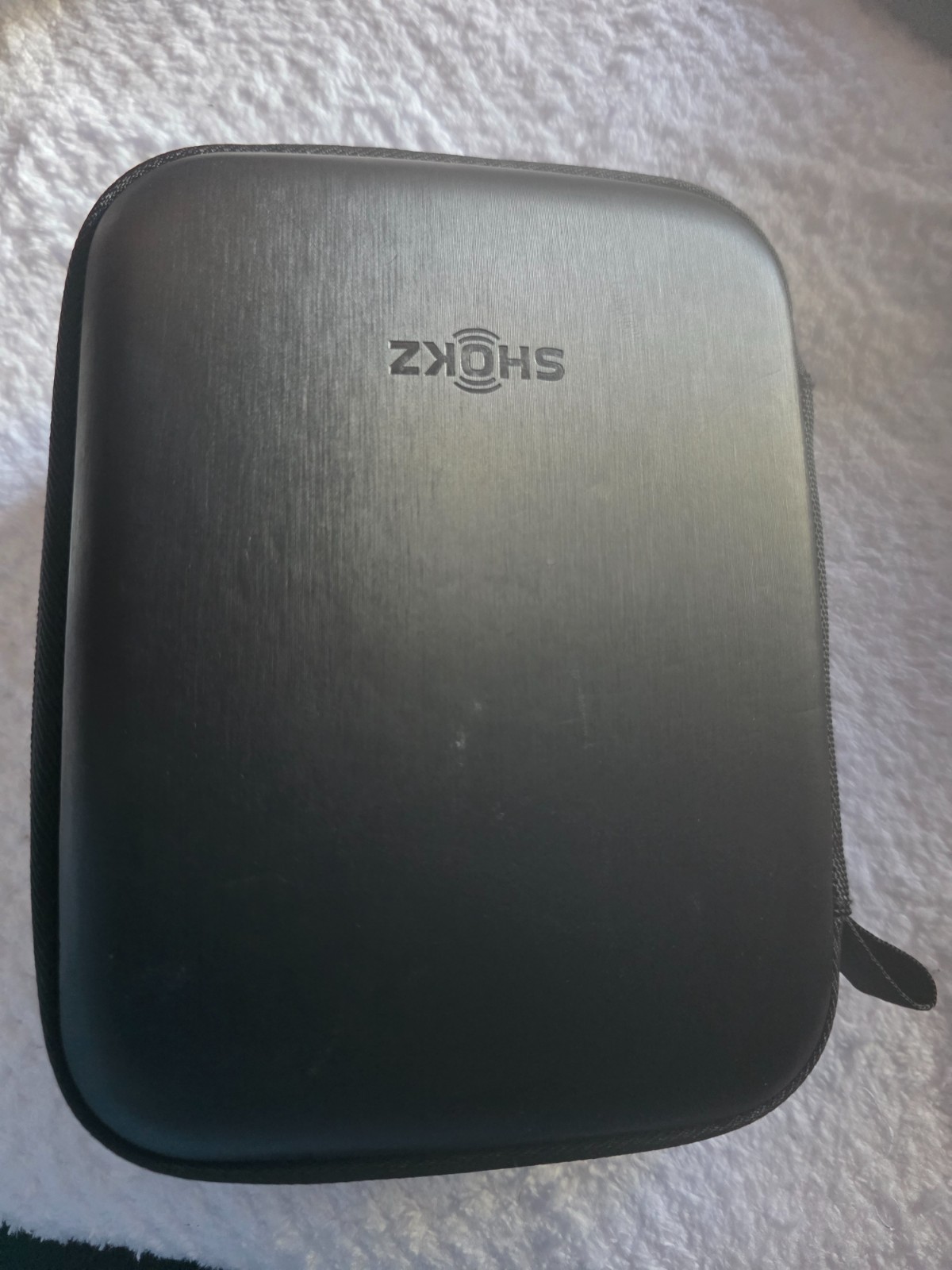 shok open comm black Bluetooth wireless in their protective case