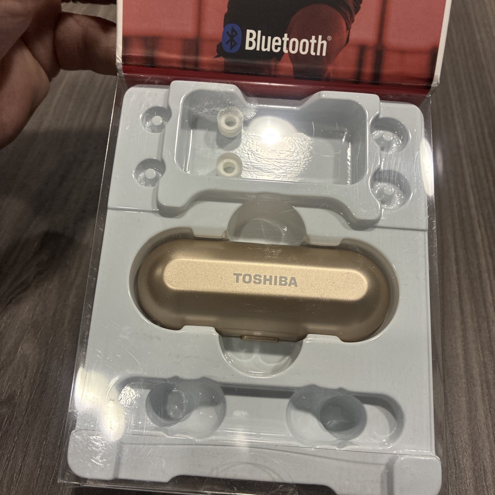 Toshiba rose gold wireless earbuds with charging case. No charger Included