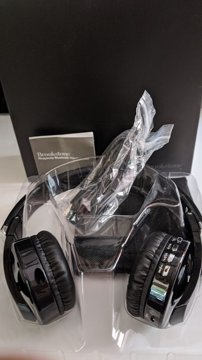 Brookstone Rhapsody Bluetooth Headphones Unused in Box w Cords USB Storage Bag