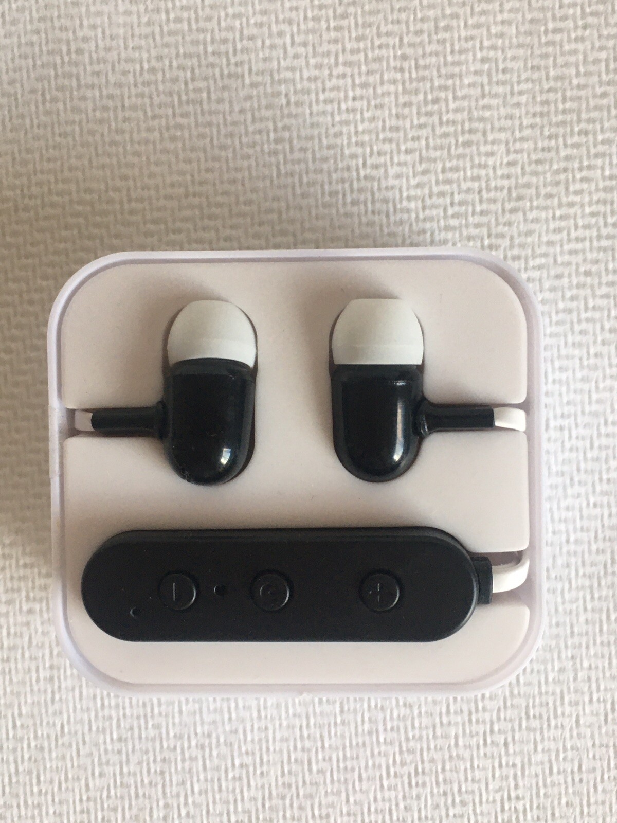 brand new, open box canada life bluetooth black/white earbuds headphones case