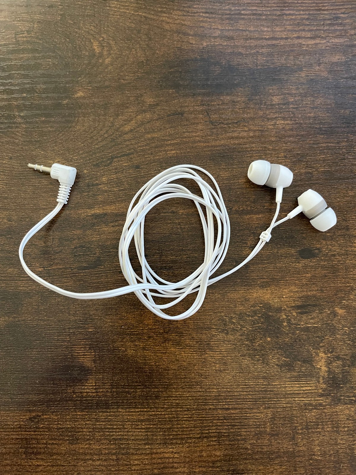 Unbranded White Wired Earbuds with a 3.5 mm Audio Jack Connector