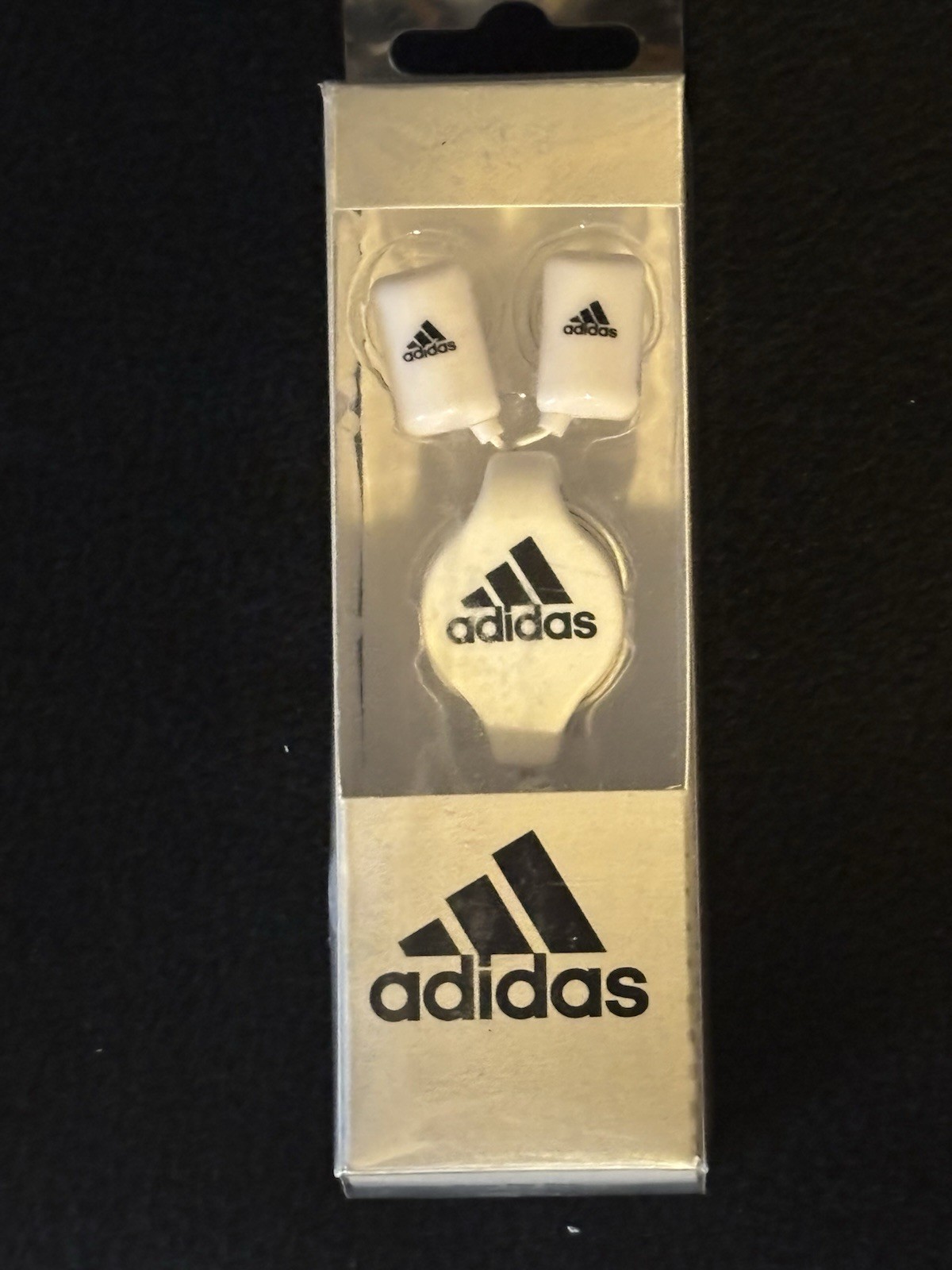Adidas branded item is a pair of retractable wired earphones New In Box
