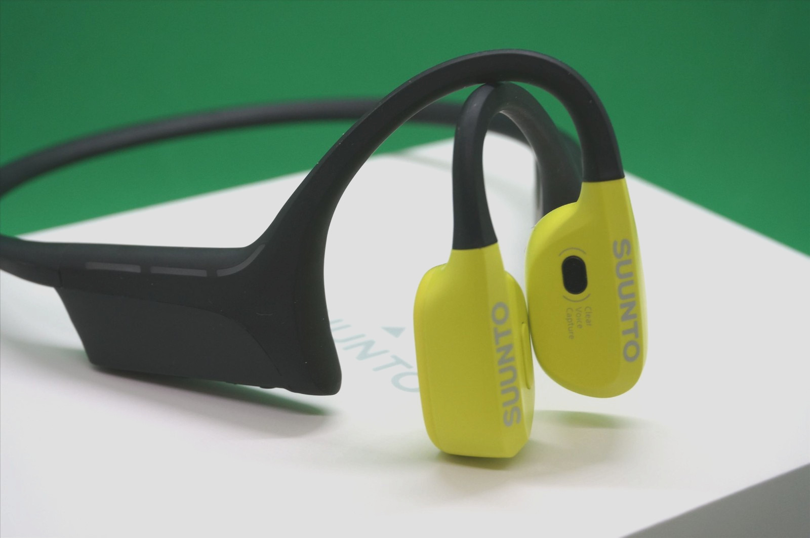 Suunto Wing Bone Conduct Headphones in Lime with flashing Red safety light IP67