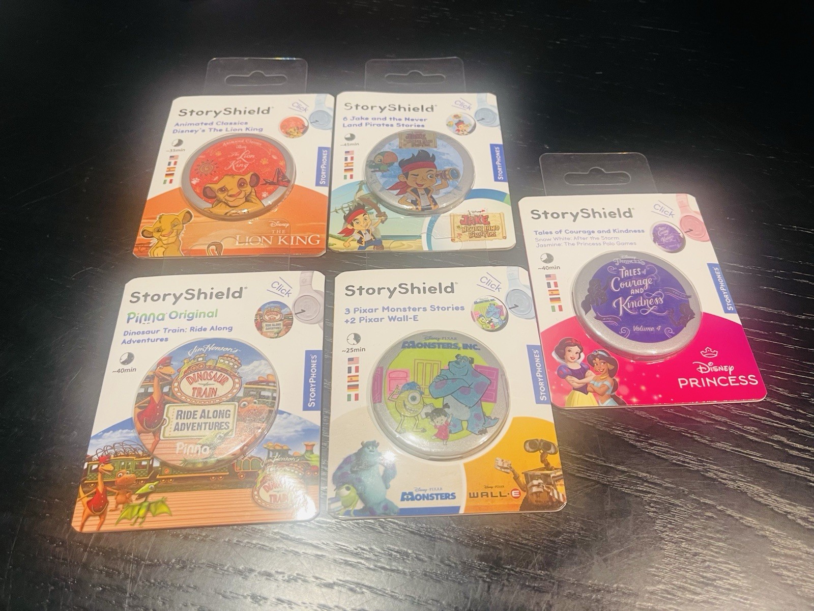 5 New StoryPhones StoryShield Disney Jake Monsters Inc Wall E Lion King Dino Pin