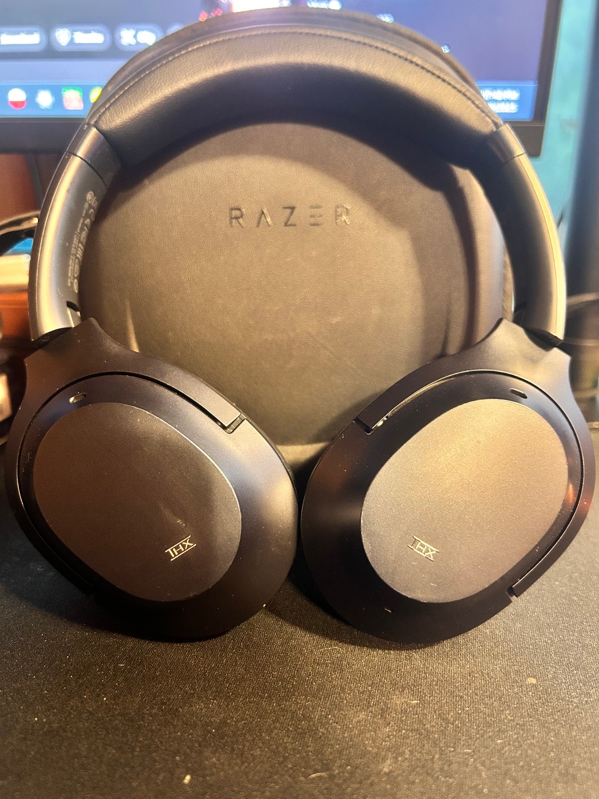 Razer Opus, ANC. Comes with Leather travel case and Airplane Adapter.
