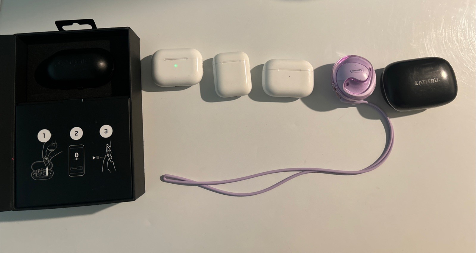 A Collection of Earbuds with Three AirPods Pro and Other Branded Headphones