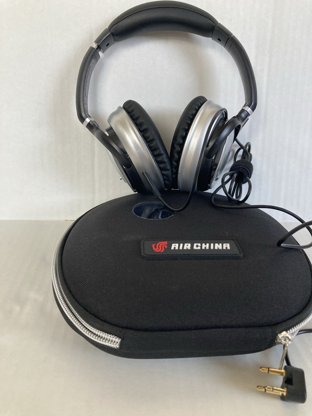 Air China Noise Cancelling Over The Head Earphones PREOWNED