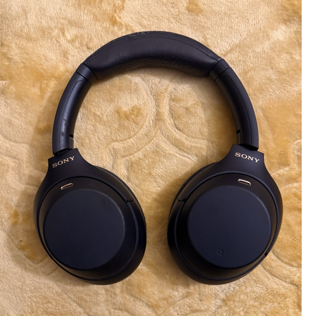 Sony WH-1000XM4 wireless noise cancelling headphones in Midnight Blue.