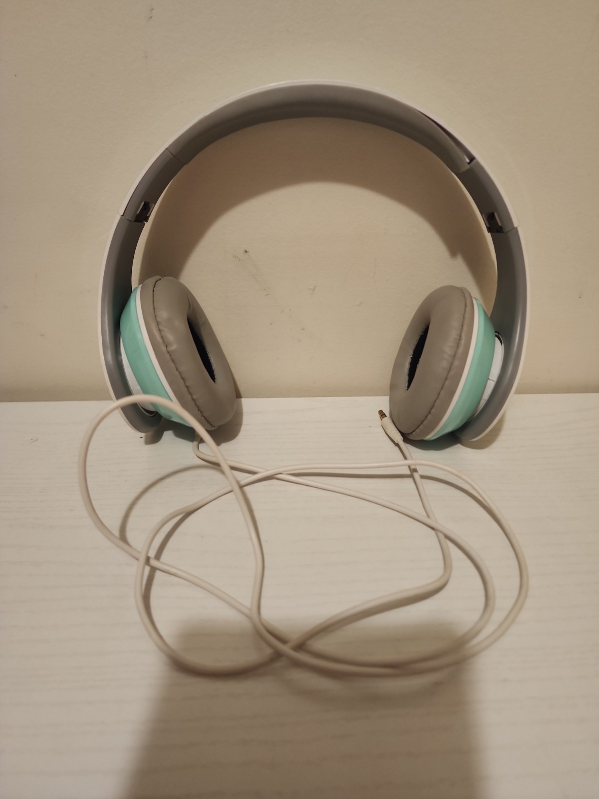 kids mint green corded headphones