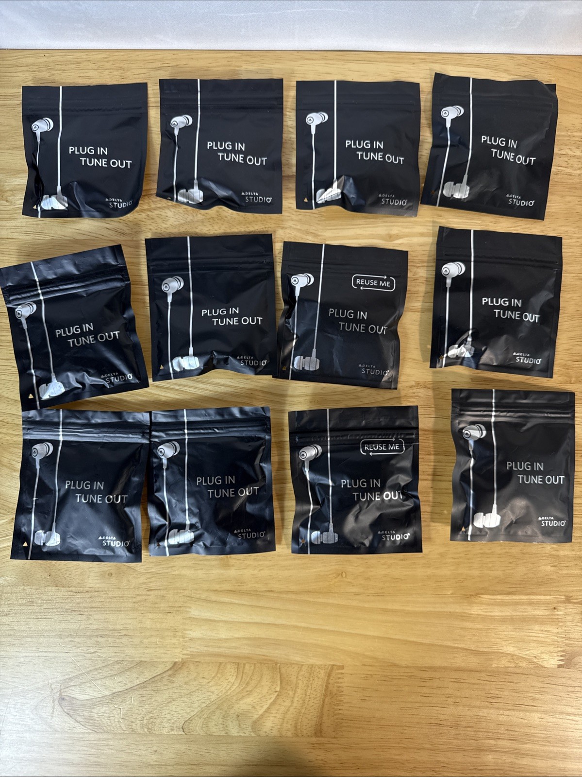 Plug In Tune Out Wired Earphones 12-Pack Delta Airplane Earphones New