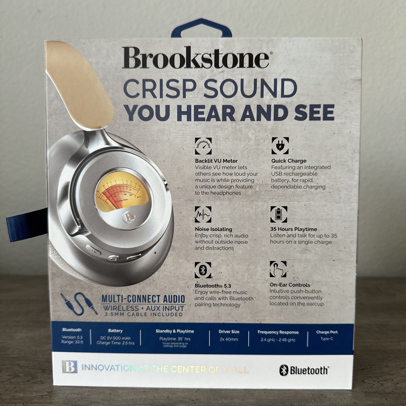 BROOKSTONE ACOUSTIC PRO WIRELESS METERED HEADPHONES 35 HOURS PLAYTIME.