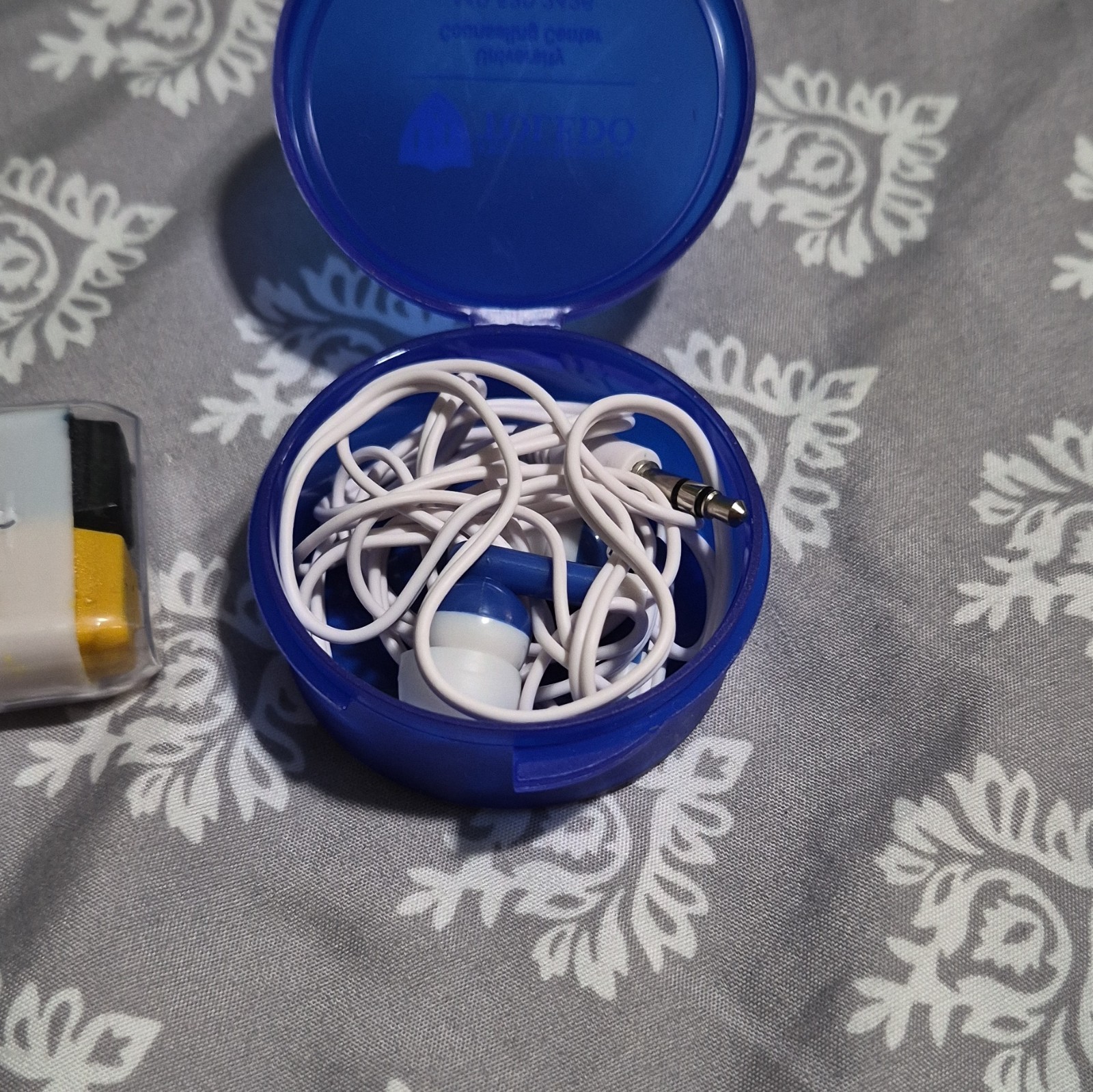University of Toledo Go Rockets Blue/White Earbuds and blue/yellow eye black