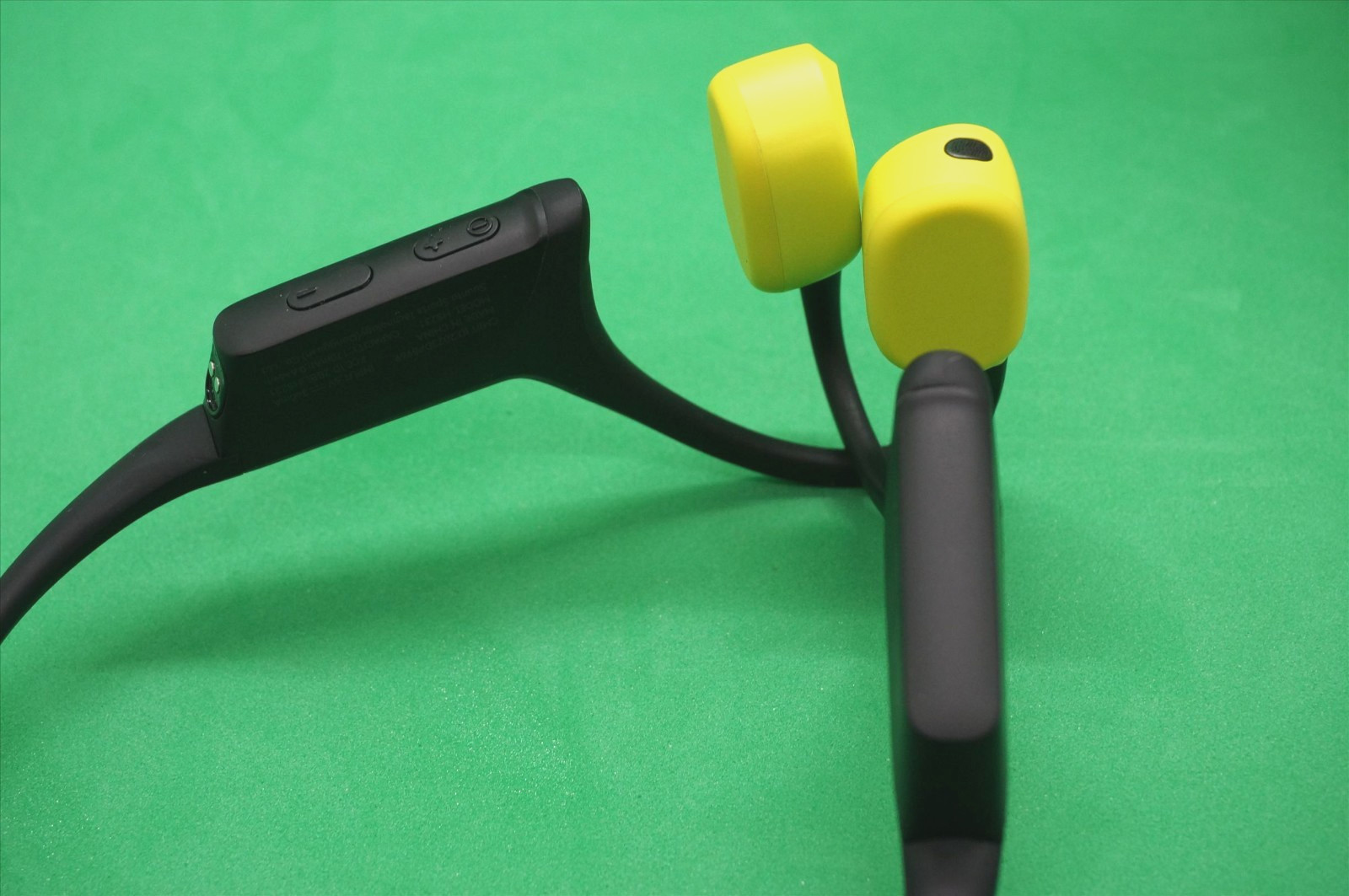 Suunto Wing Bone Conduct Headphones in Lime with flashing Red safety light IP67